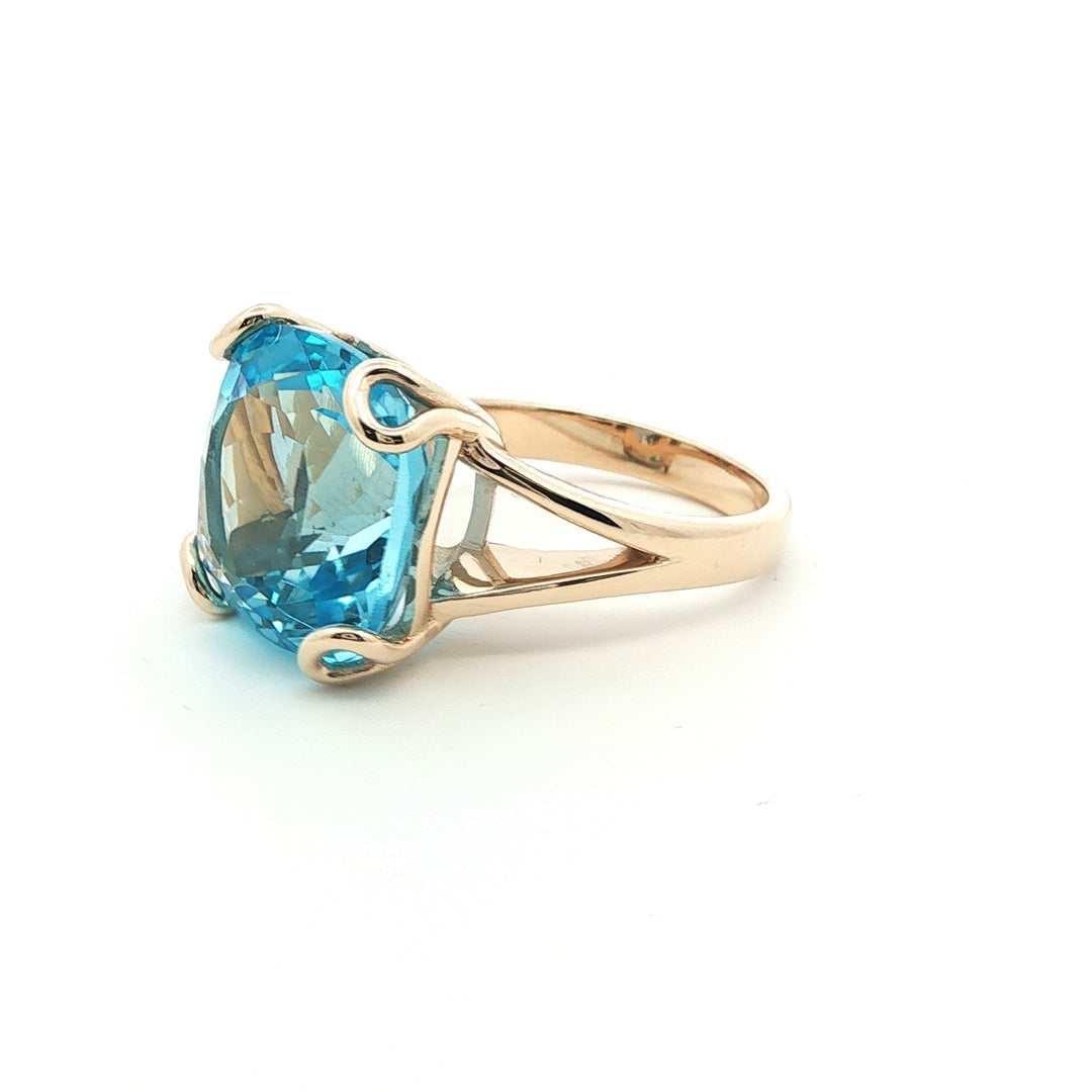 9ct y/g 4 dbl claw 16.61ct Natural Swiss Blue Topaz