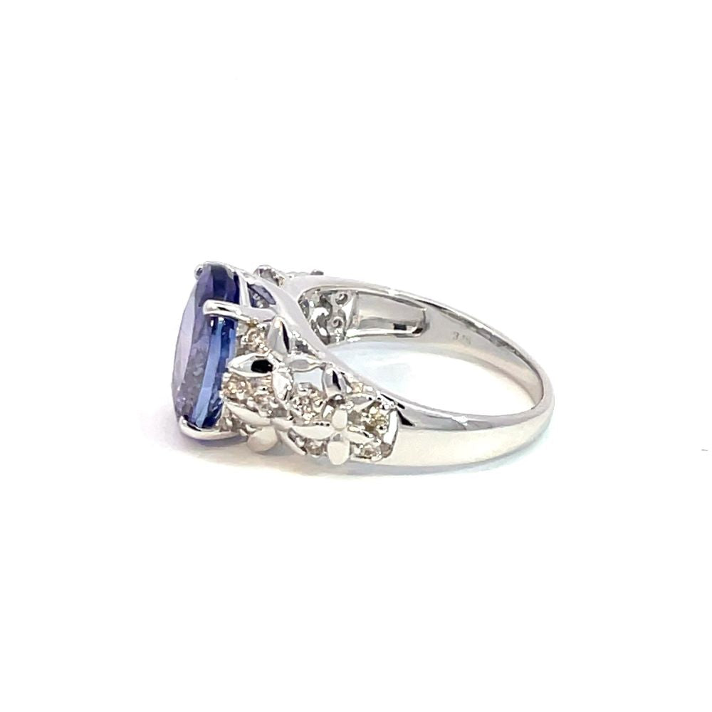 Oval Tanzanite set in 9ct White Gold with Flower Design