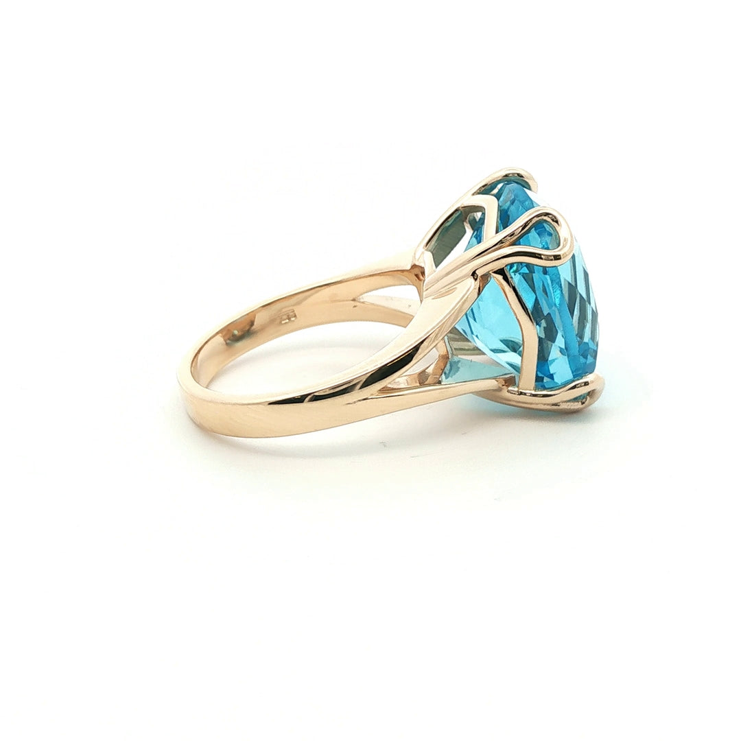 9ct y/g 4 dbl claw 16.61ct Natural Swiss Blue Topaz