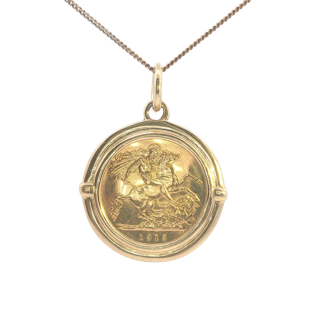 Half sovereign set in a 9ct Yellow Gold mount