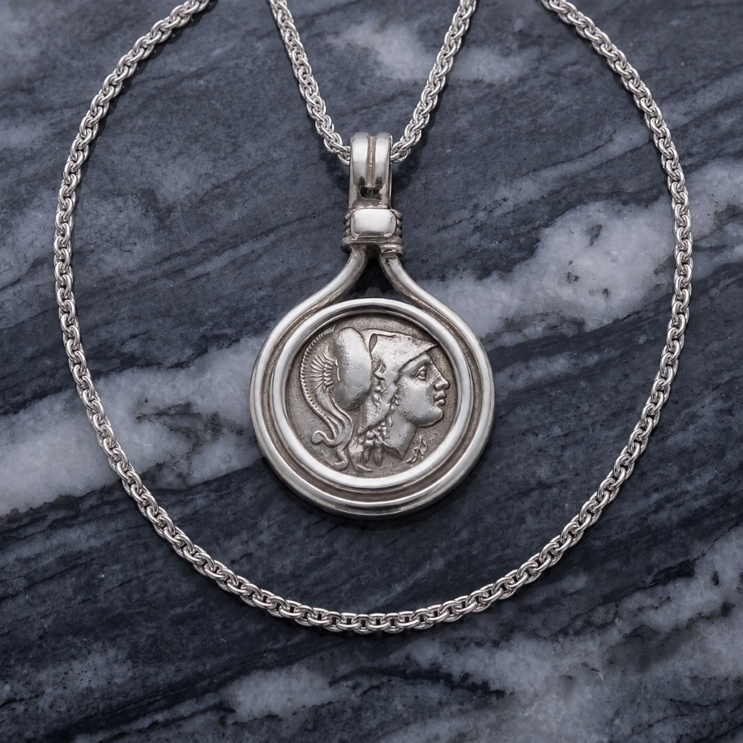 Sterling silver Oxideised Coin Pendant set in a sterling silver mount.
